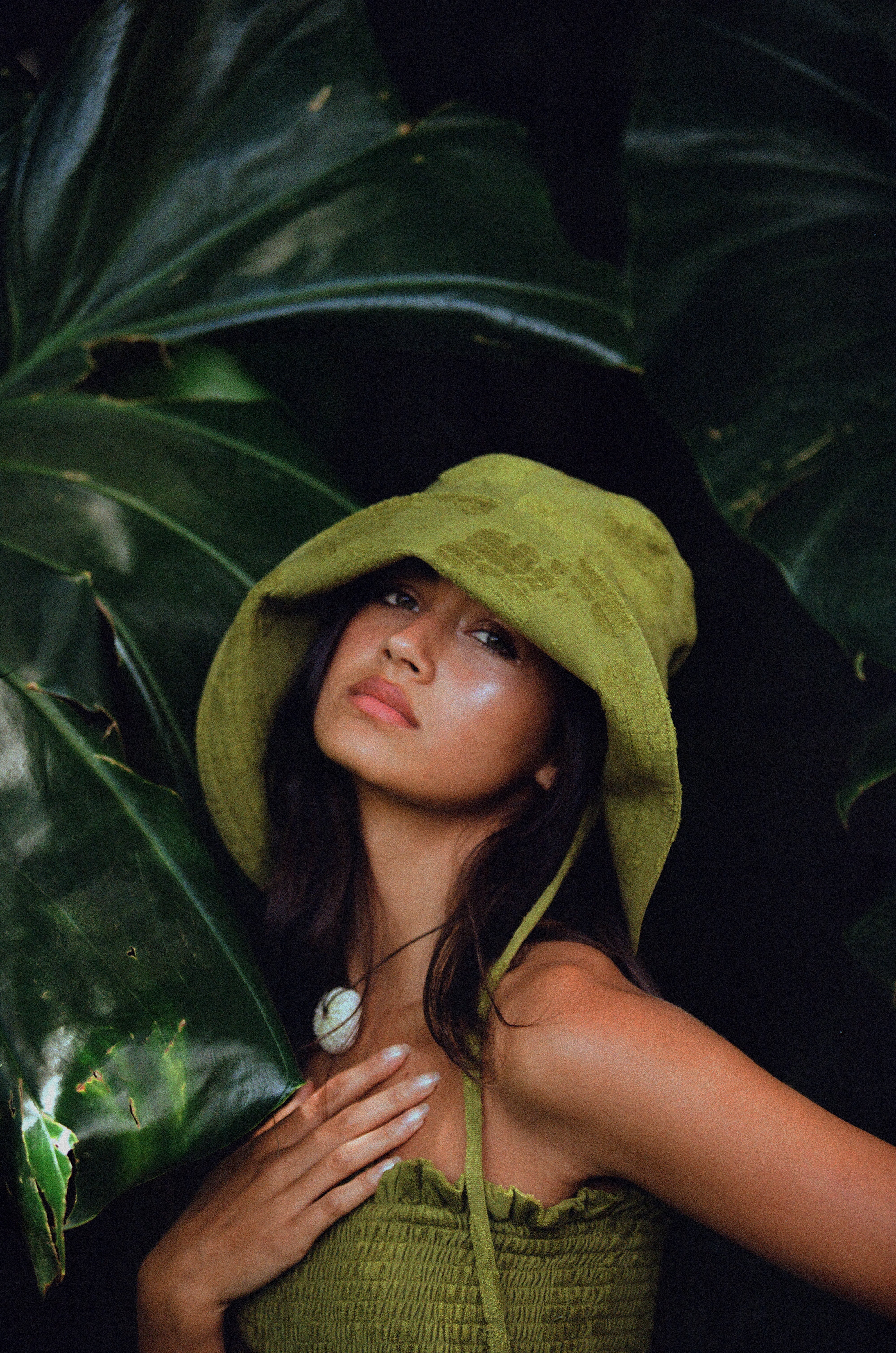 girl in matching green hat with green dress