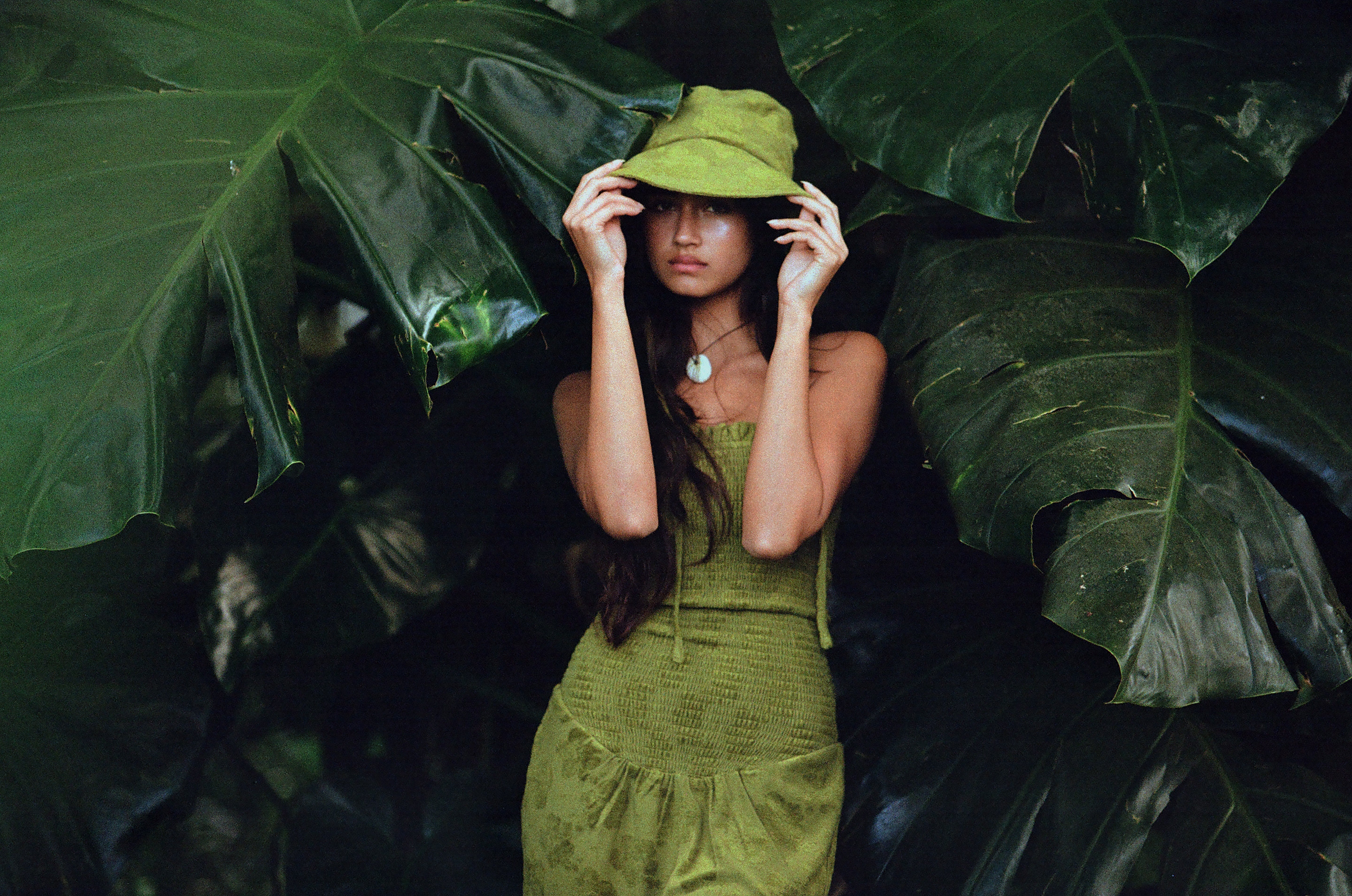 Girl in green hat and green dress