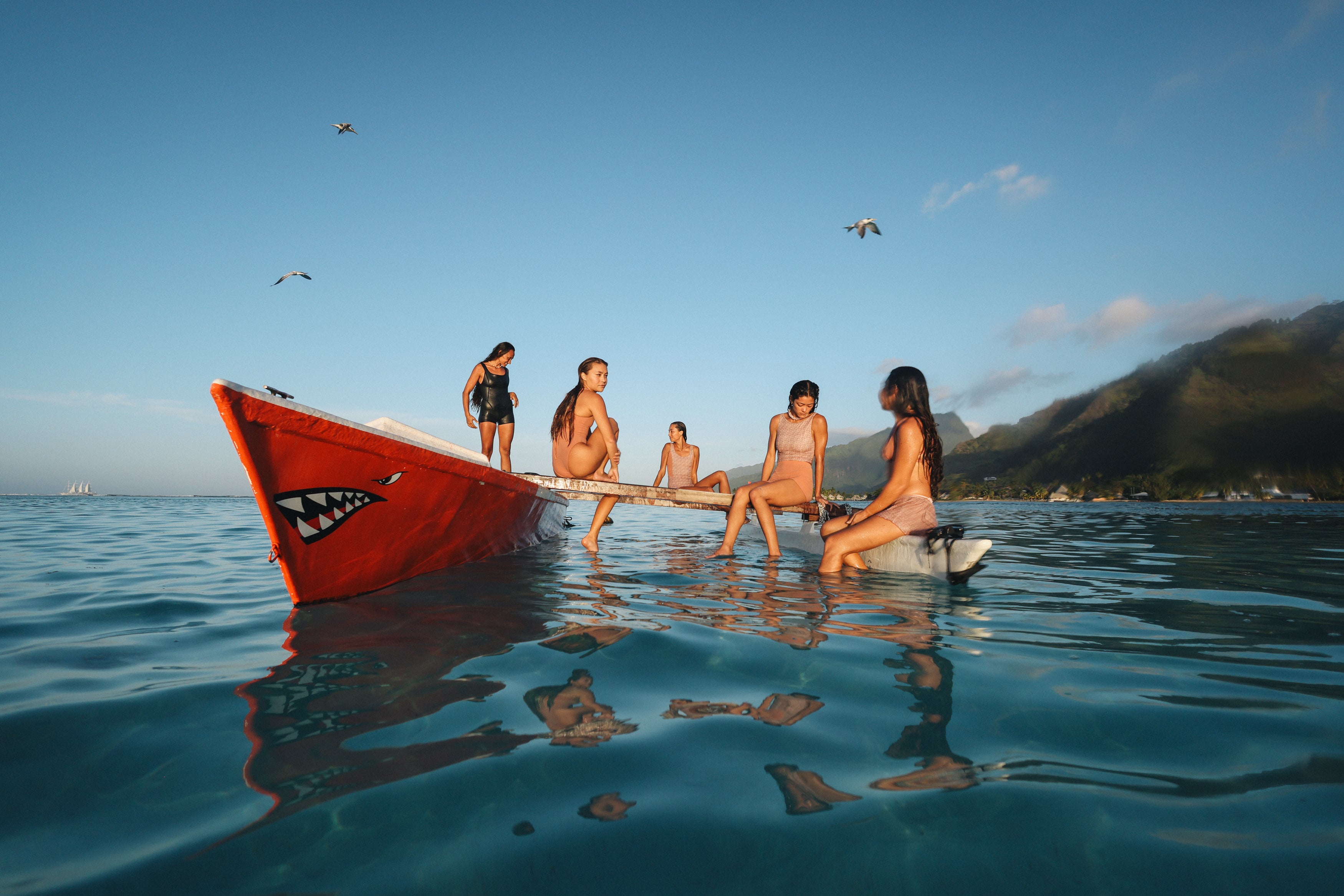 girls on canoe